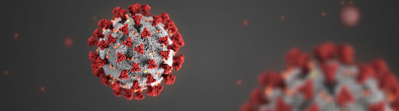 3D illustration of a COVID-19 particle, showing a grey sphere with red spike proteins protruding from its surface, set against a dark blurred background.