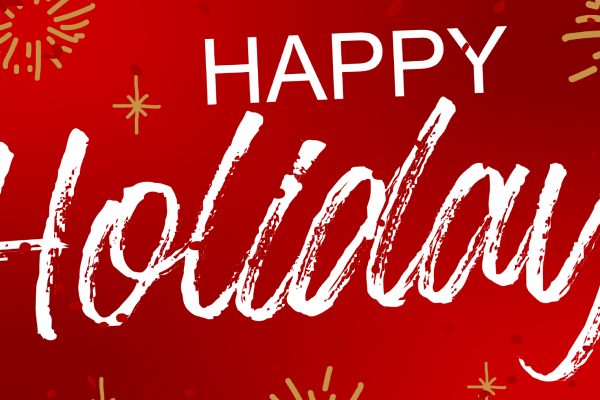 Red festive banner with white text that reads Happy Holidays! surrounded by gold fireworks and sparkles on a gradient red background, celebrating the season with GoodSuite’s cheerful touch.